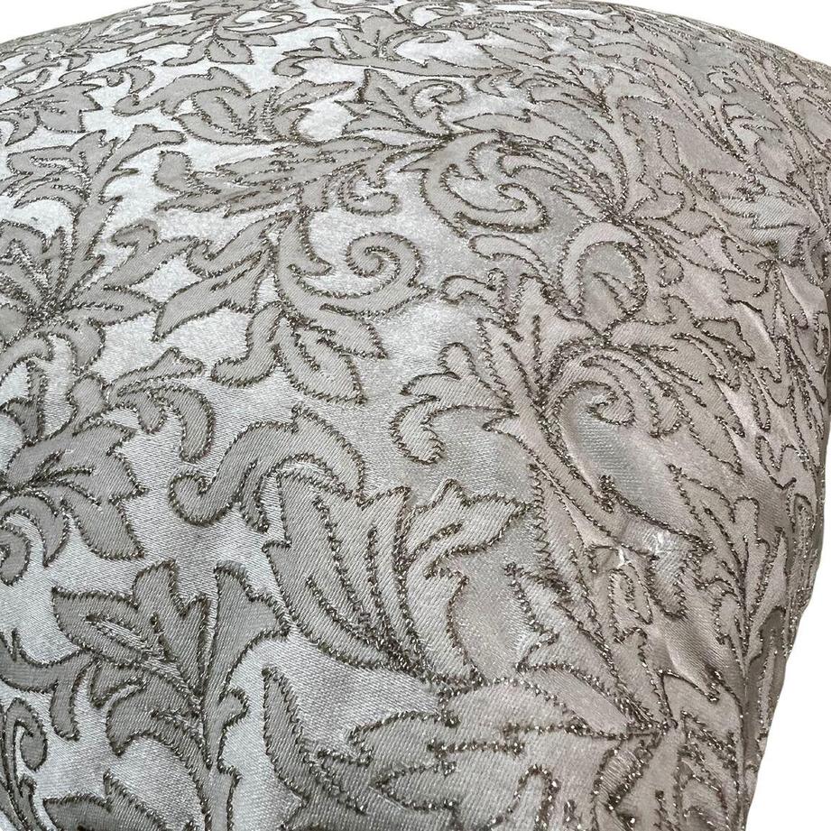 Ivory gold leafy design on the silk cushions