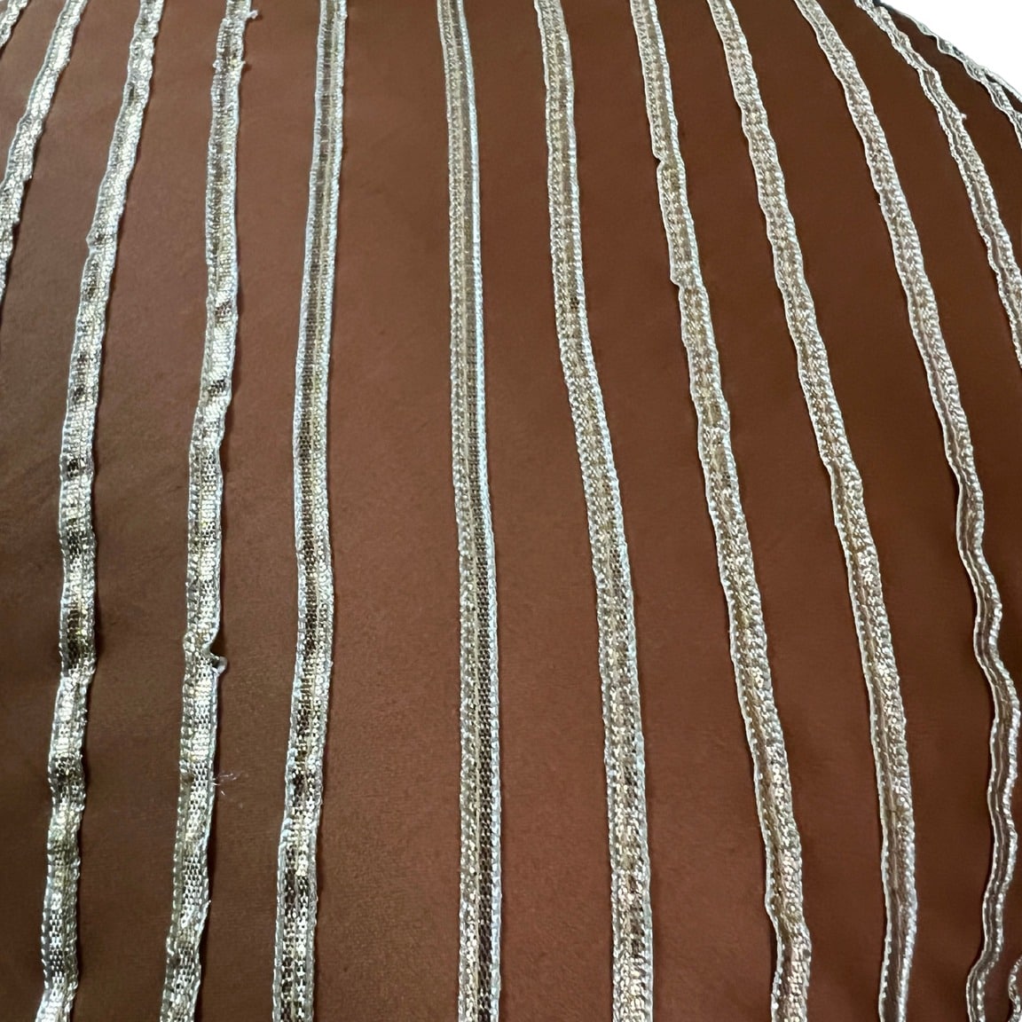 Rusk cushion cover with golden stripes