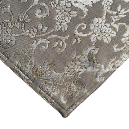 A corner piece of the Classic Gold Jacquard Silk Mat