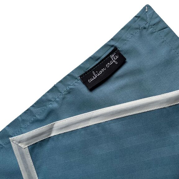 Blue Napkin with the brand tag and white borders