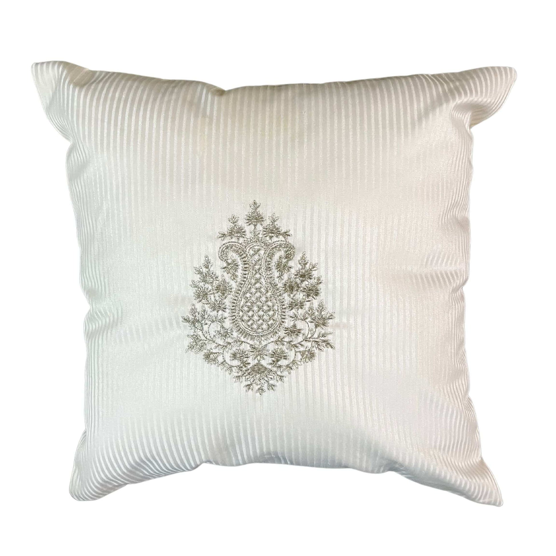 Cream cushion with offwhite stripes and a design in the middle