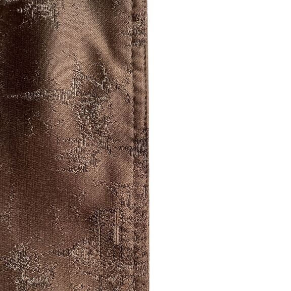 A brown piece of Jacquared fabric